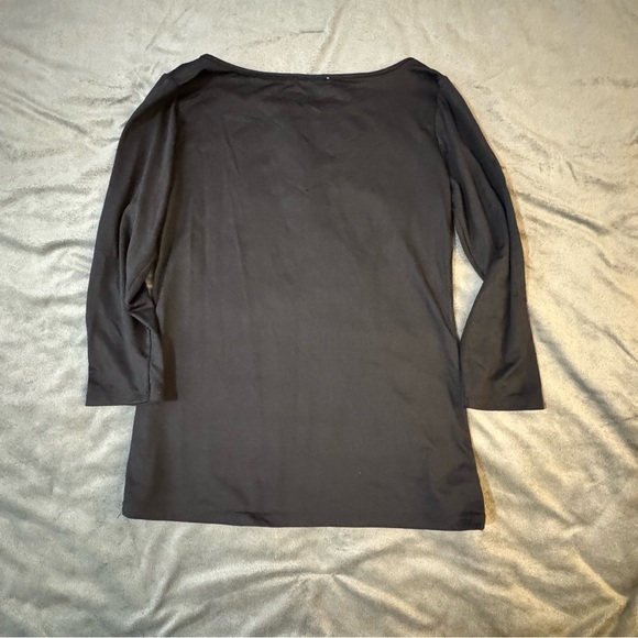 Zara Black Fitted Blouse

#1121 - Picture 6 of 6